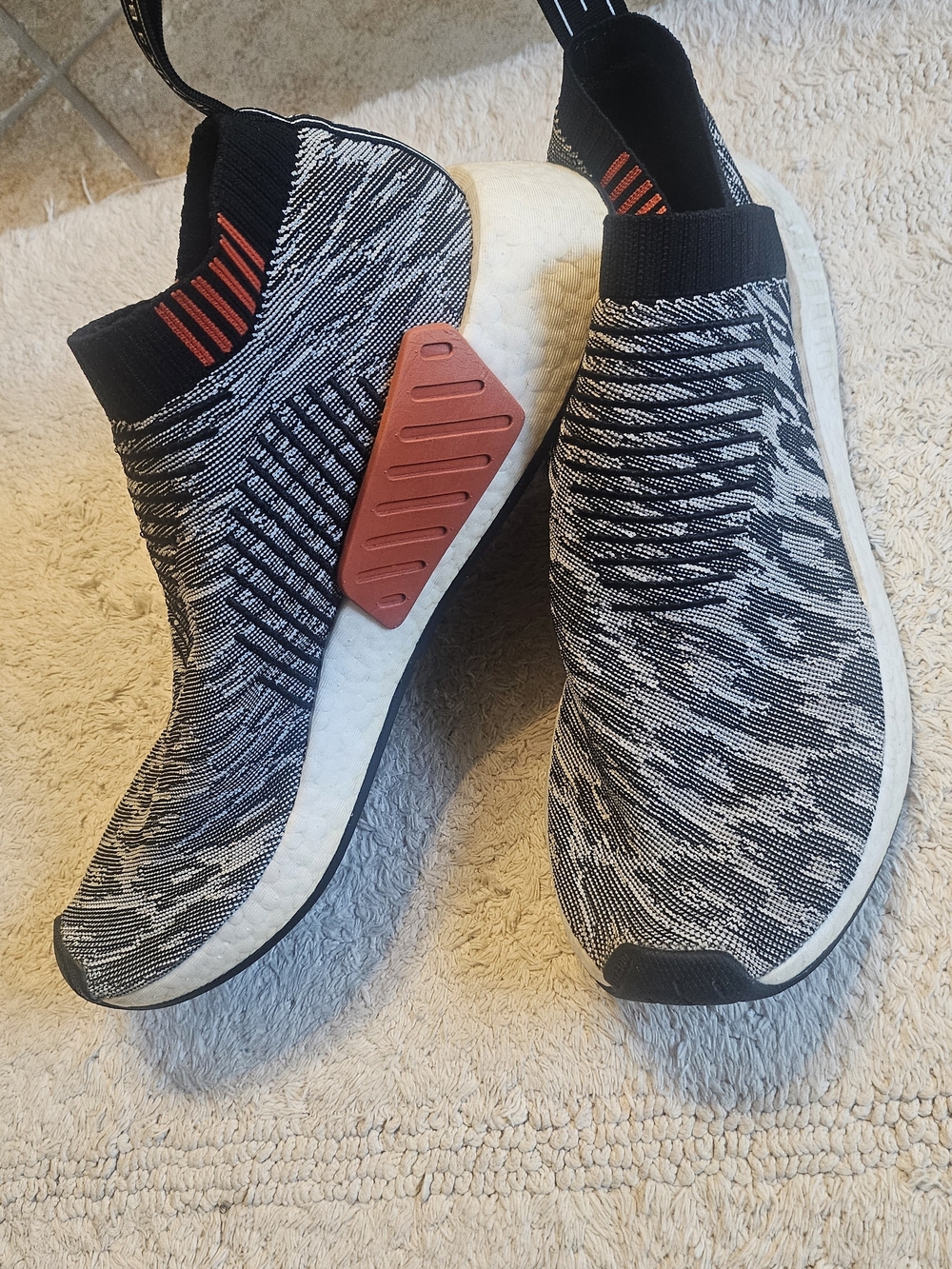 adidas Black & White Slip-On Knit Sneakers with Red Accent